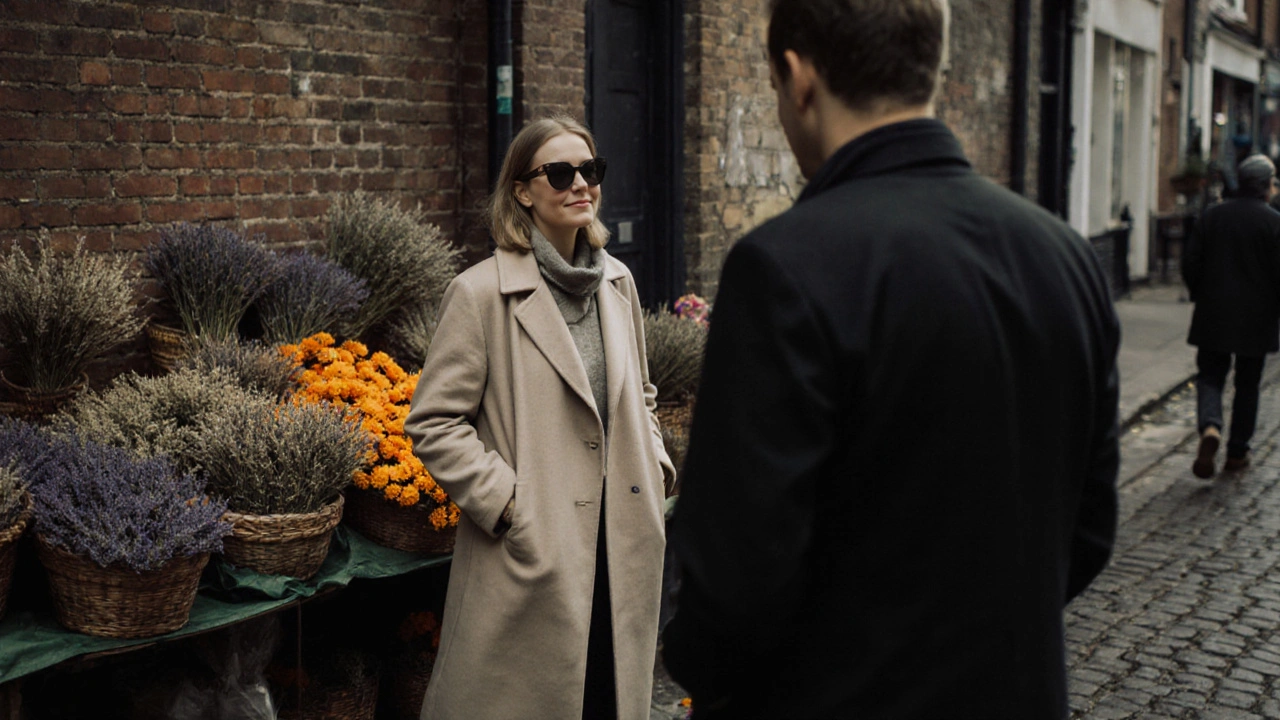 A woman and man make eye contact at Columbia Road Flower Market, soft afternoon light, flowers in the background.