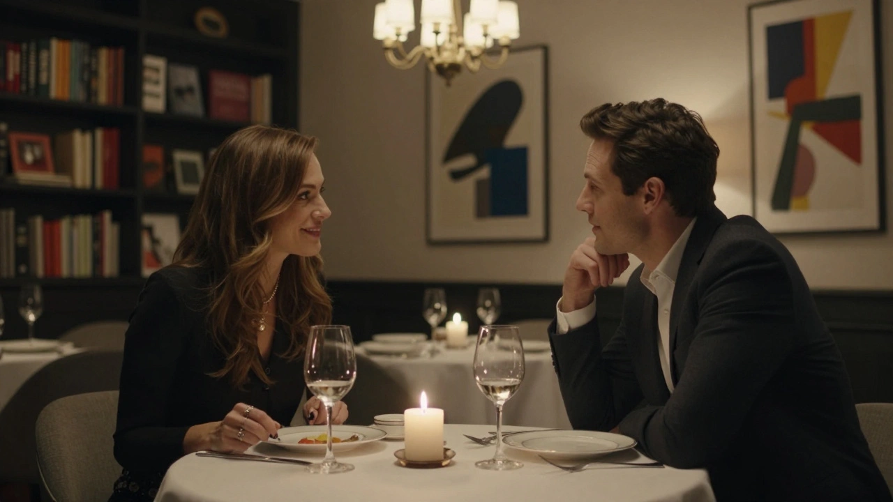 A couple shares a quiet dinner in a boutique hotel suite, candlelight illuminating their thoughtful conversation.